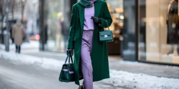 Stylish woman in emerald green and lavender outfit for Winter 2026
